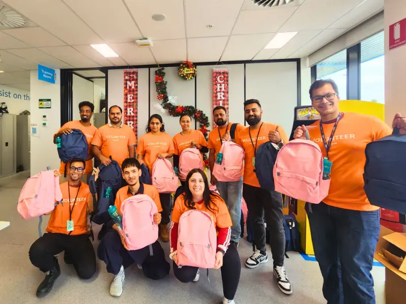 employee volunteer program backpacks for school kids