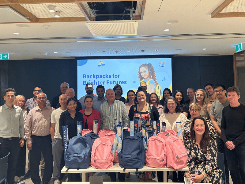 employee volunteer program backpacks for school kids