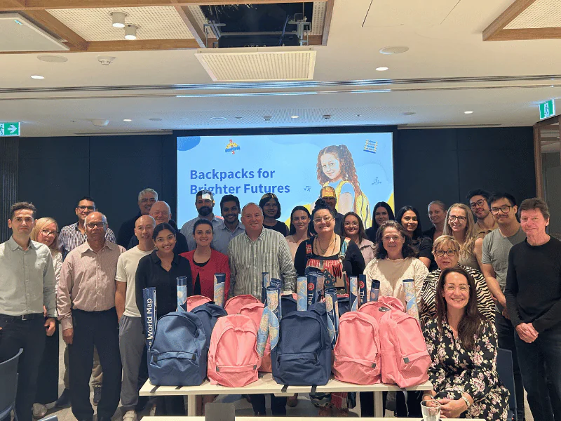employee volunteer program backpacks for school kids