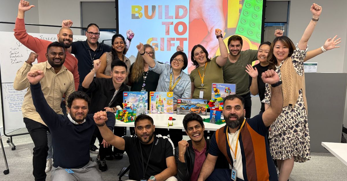 Corporate team celebrating after their teambuilding event.